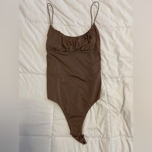 brown BetterBe bodysuit from pseudio